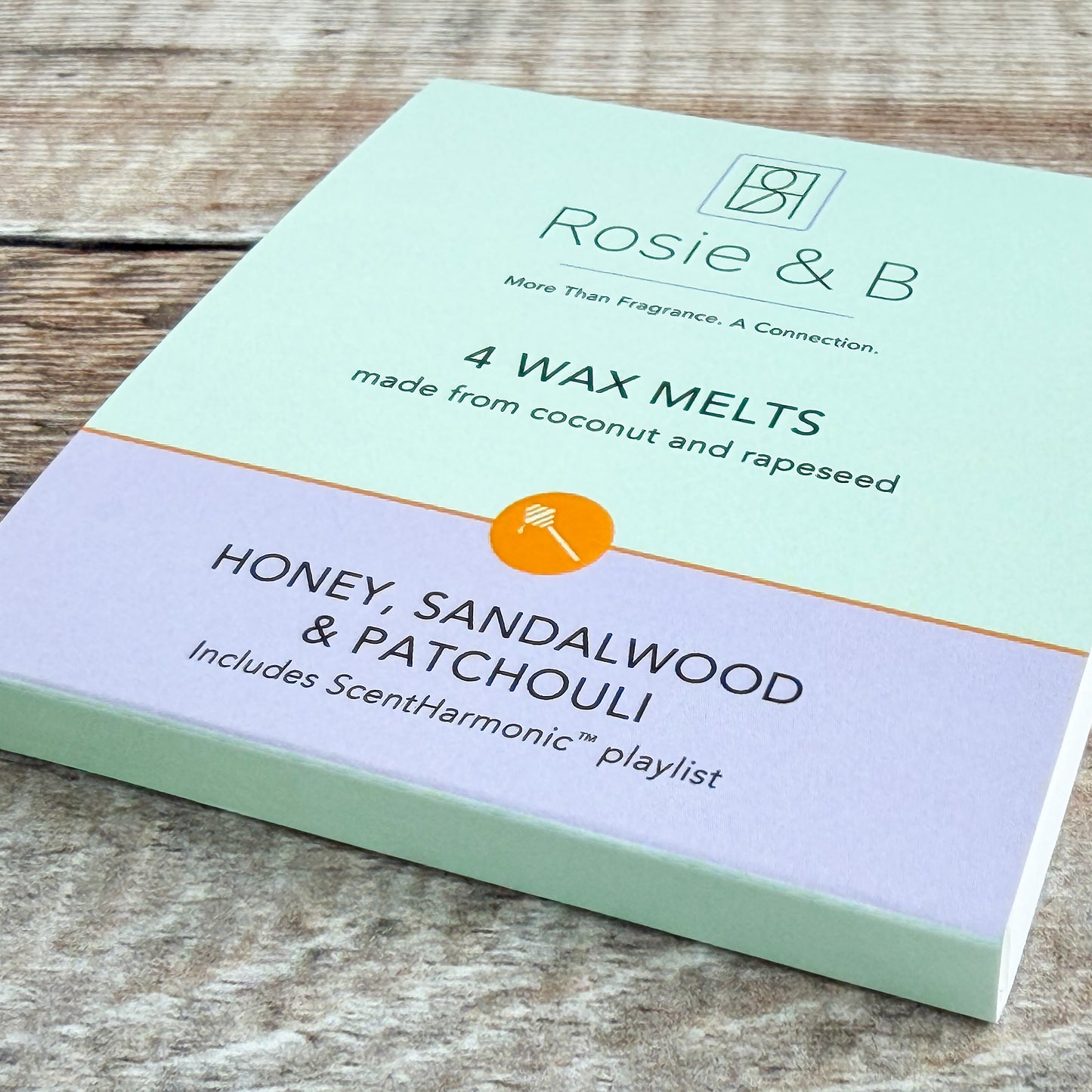 Honey, Sandalwood & Patchouli wax melts sleeve, angled product shot