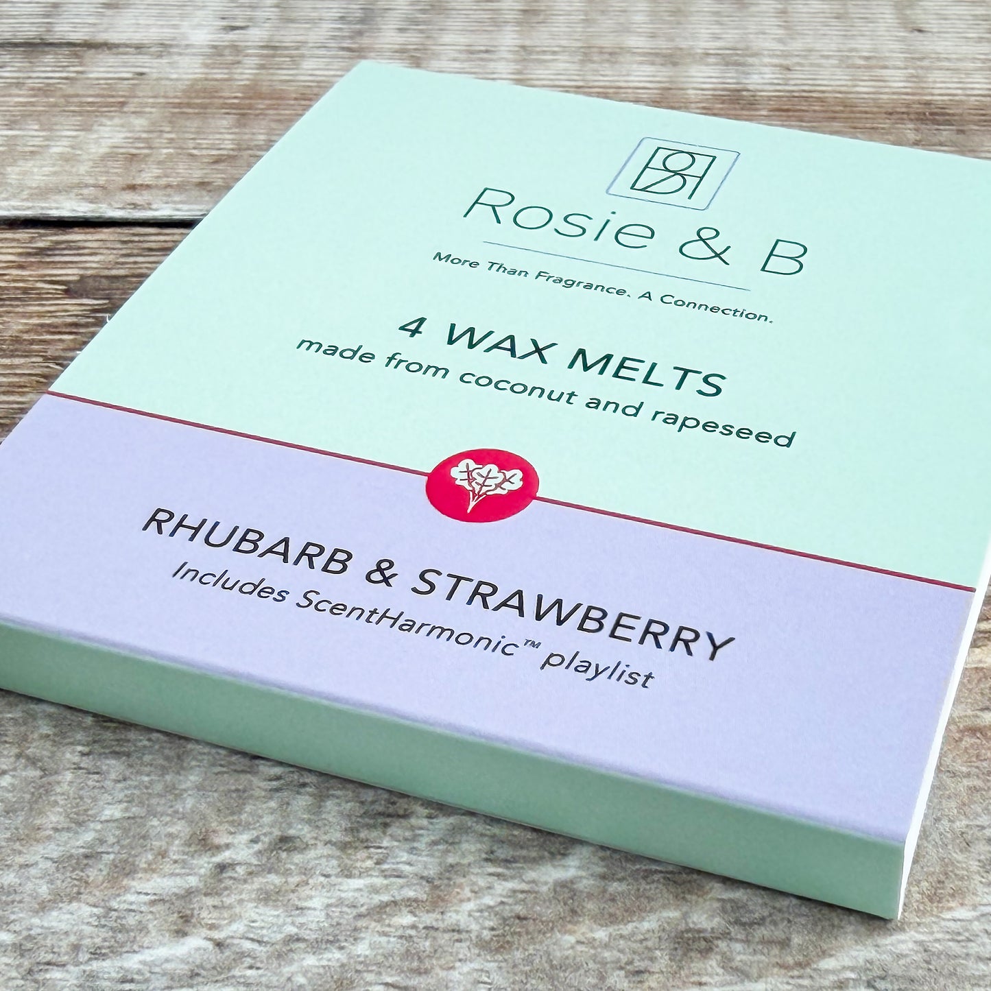 Rhubarb & Strawberry wax melts sleeve, angled product shot
