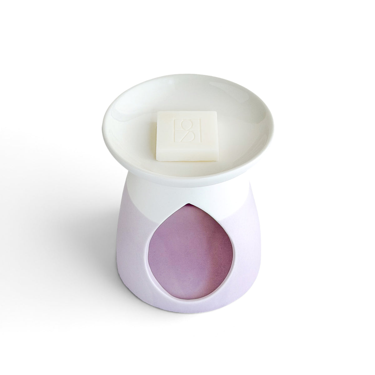 Arabella ceramic wax warmer in powder pink, from above with a Rosie & B wax melt