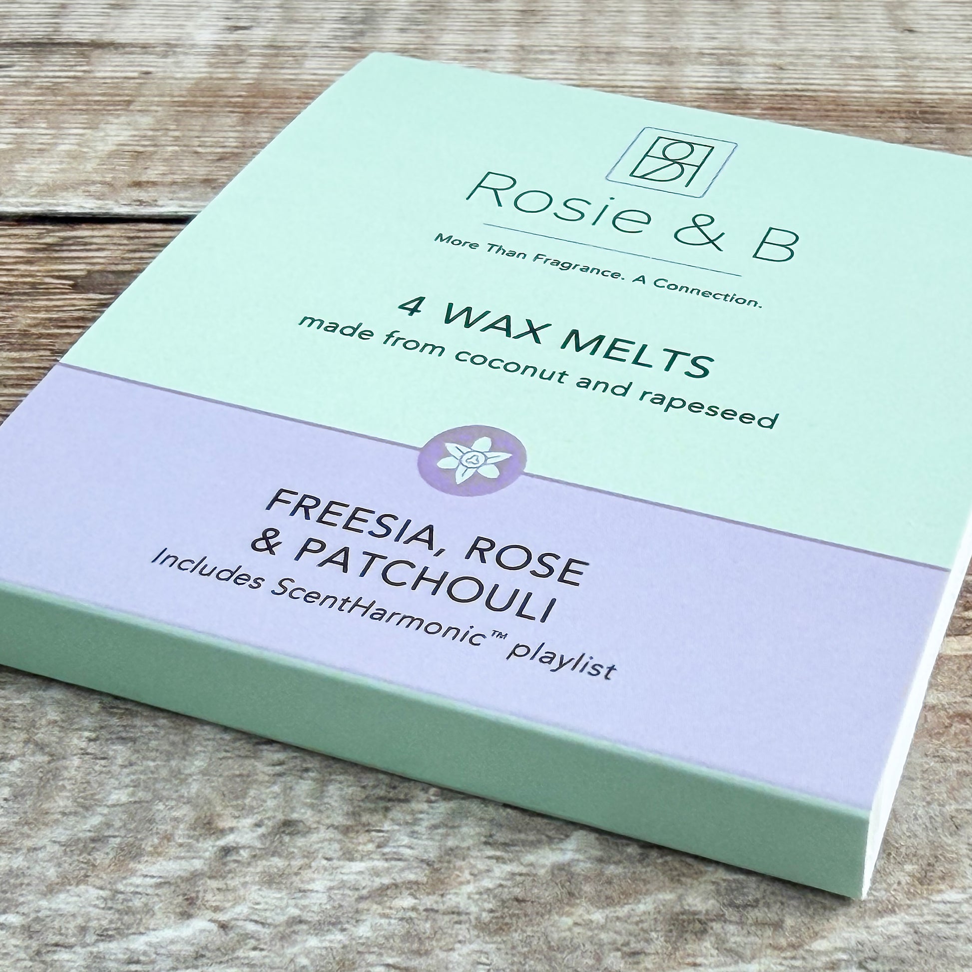 Freesia, Rose & Patchouli wax melts sleeve, angled product shot