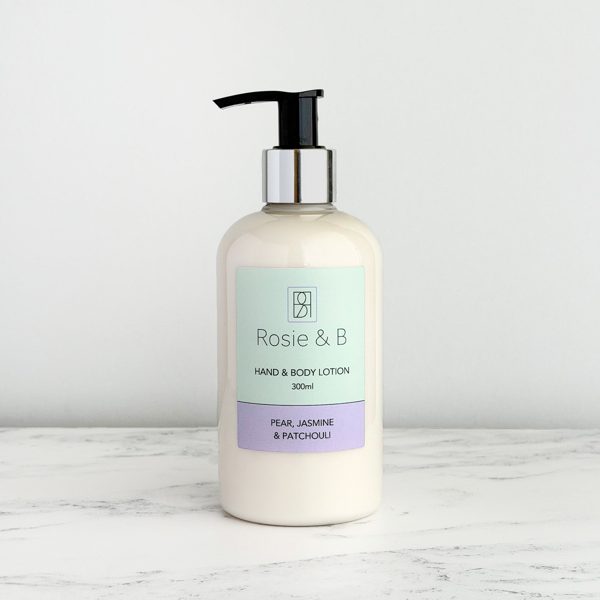 Pear, Jasmine & Patchouli Hand & Body Lotion bottle, front