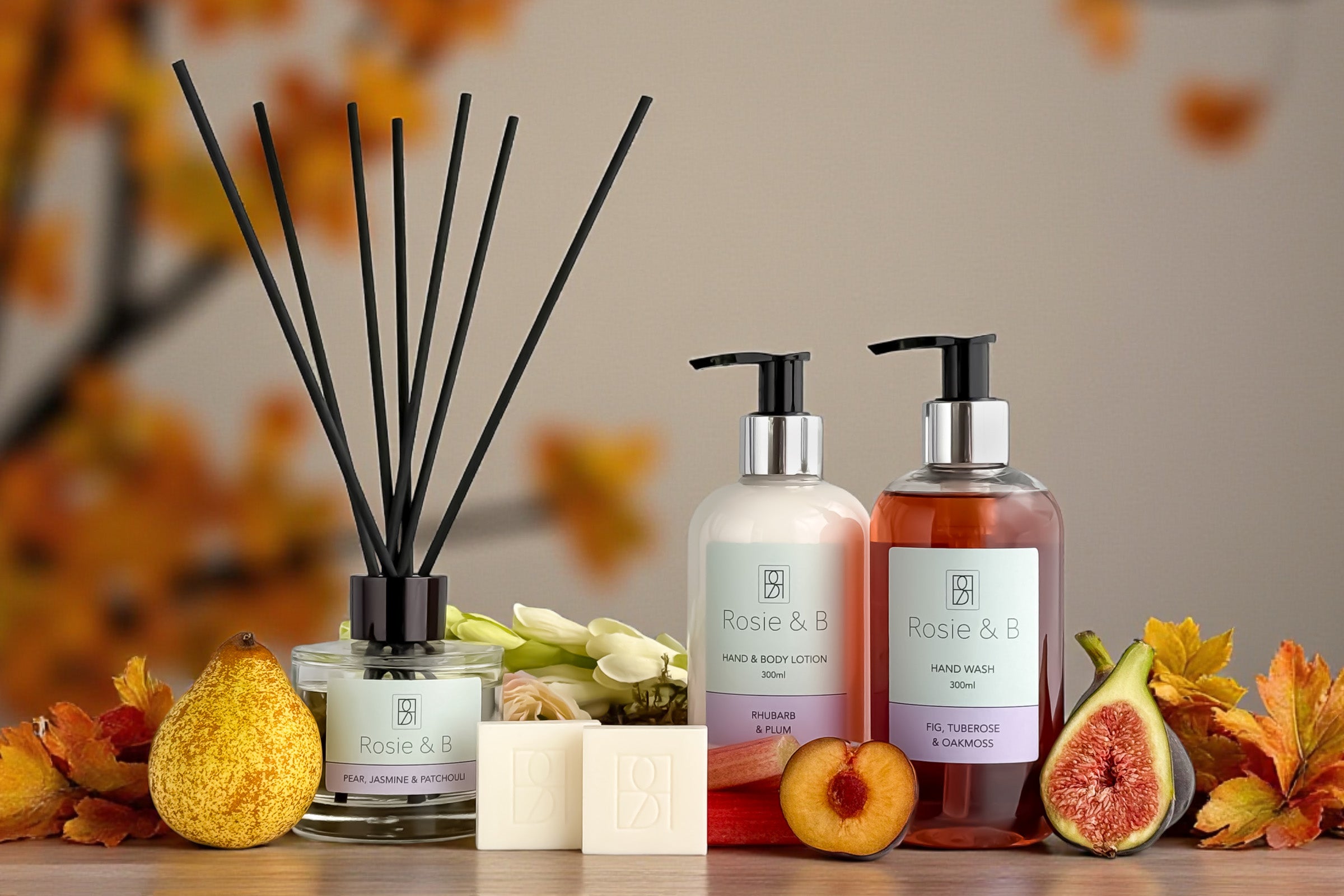Rosie & B autumn product display with reed diffuser, wax melts, hand wash and hand & body lotion.