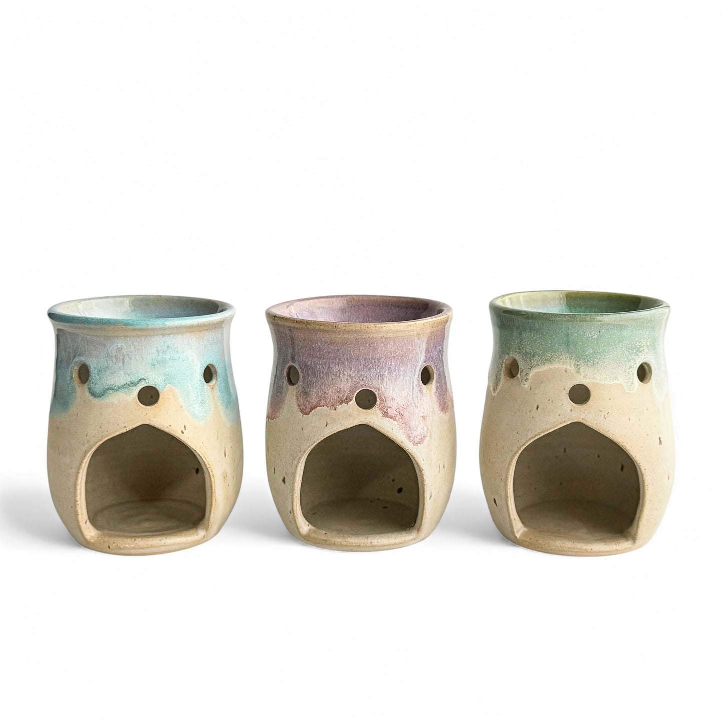 A trio of Leonore wax melt warmers in Azure Blue & Oatmeal, Lavender Haze & Oatmeal and Hazel Green & Oatmeal