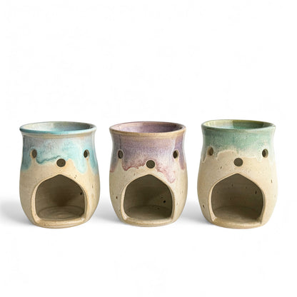A trio of Leonore wax melt warmers in Azure Blue & Oatmeal, Lavender Haze & Oatmeal and Hazel Green & Oatmeal