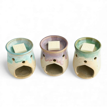 A trio of Leonore wax melt warmers in Azure Blue & Oatmeal, Lavender Haze & Oatmeal and Hazel Green & Oatmeal, shown with Rosie & B wax melts