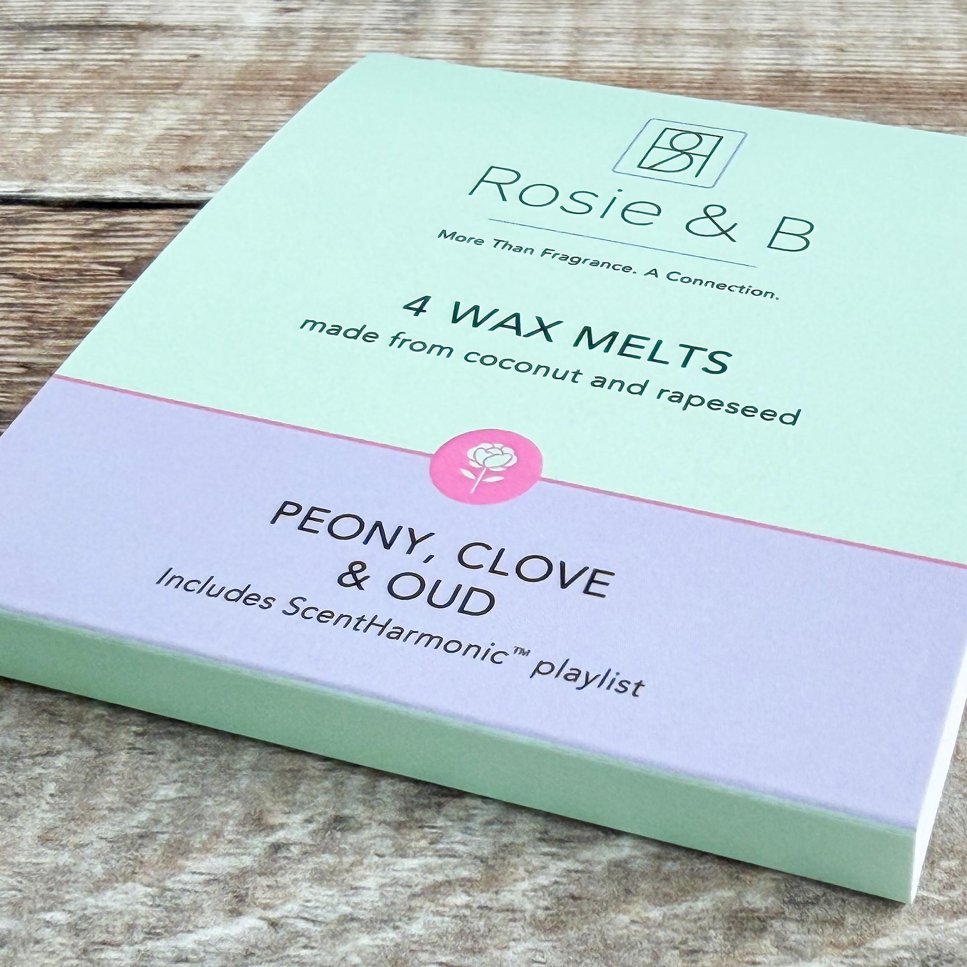 Peony, Clove & Oud wax melts sleeve, angled product shot