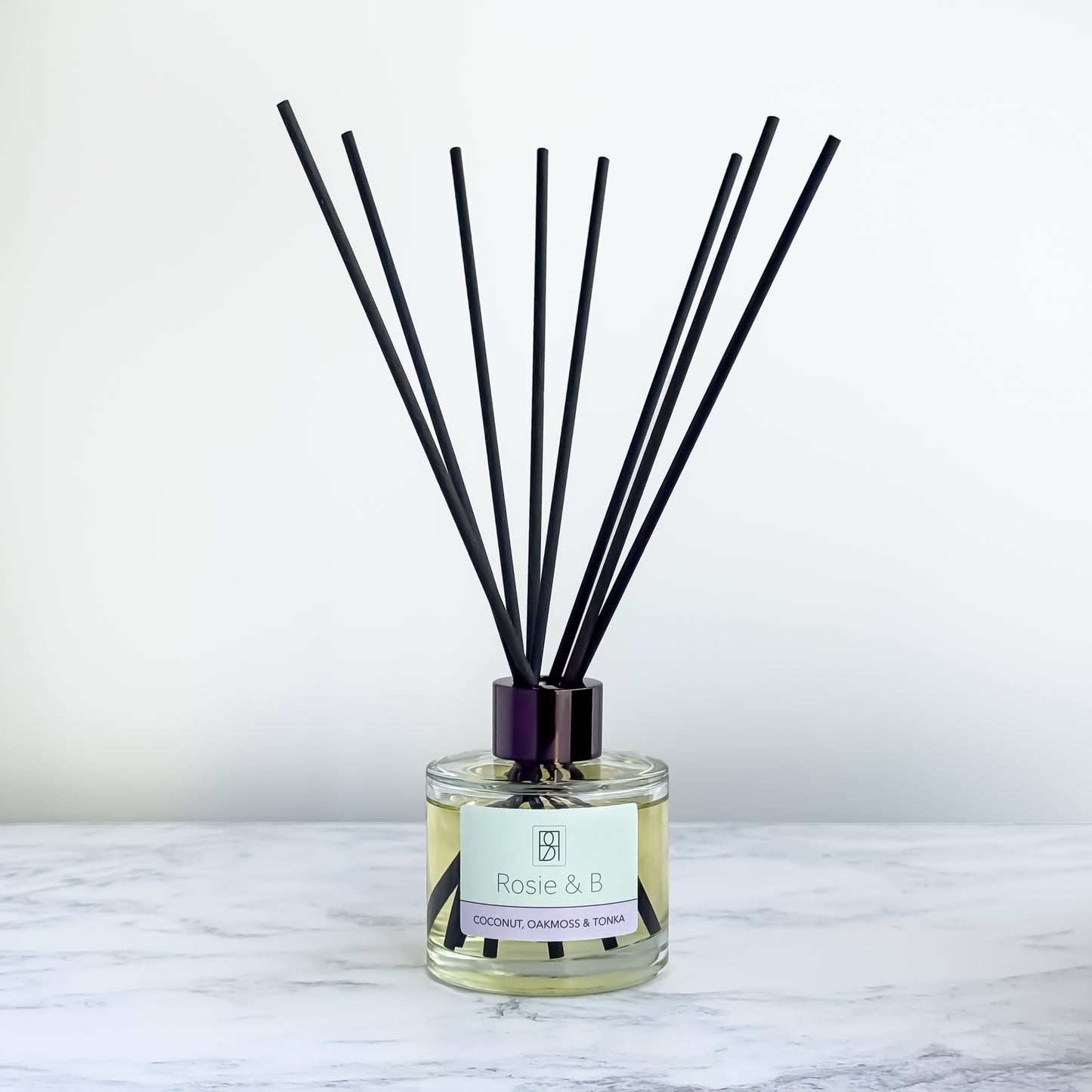 Coconut, Oakmoss & Tonka reed diffuser, bottle and reeds