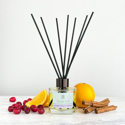 Cranberry, Orange & Cinnamon reed diffuser, styled photo